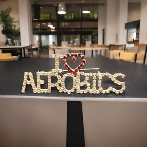 WOMEN'S " I LOVE AEROBICS RHINESTONE PIN".